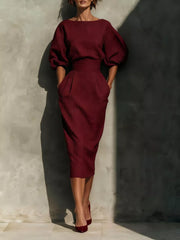 modern midi dress in orange with round neck