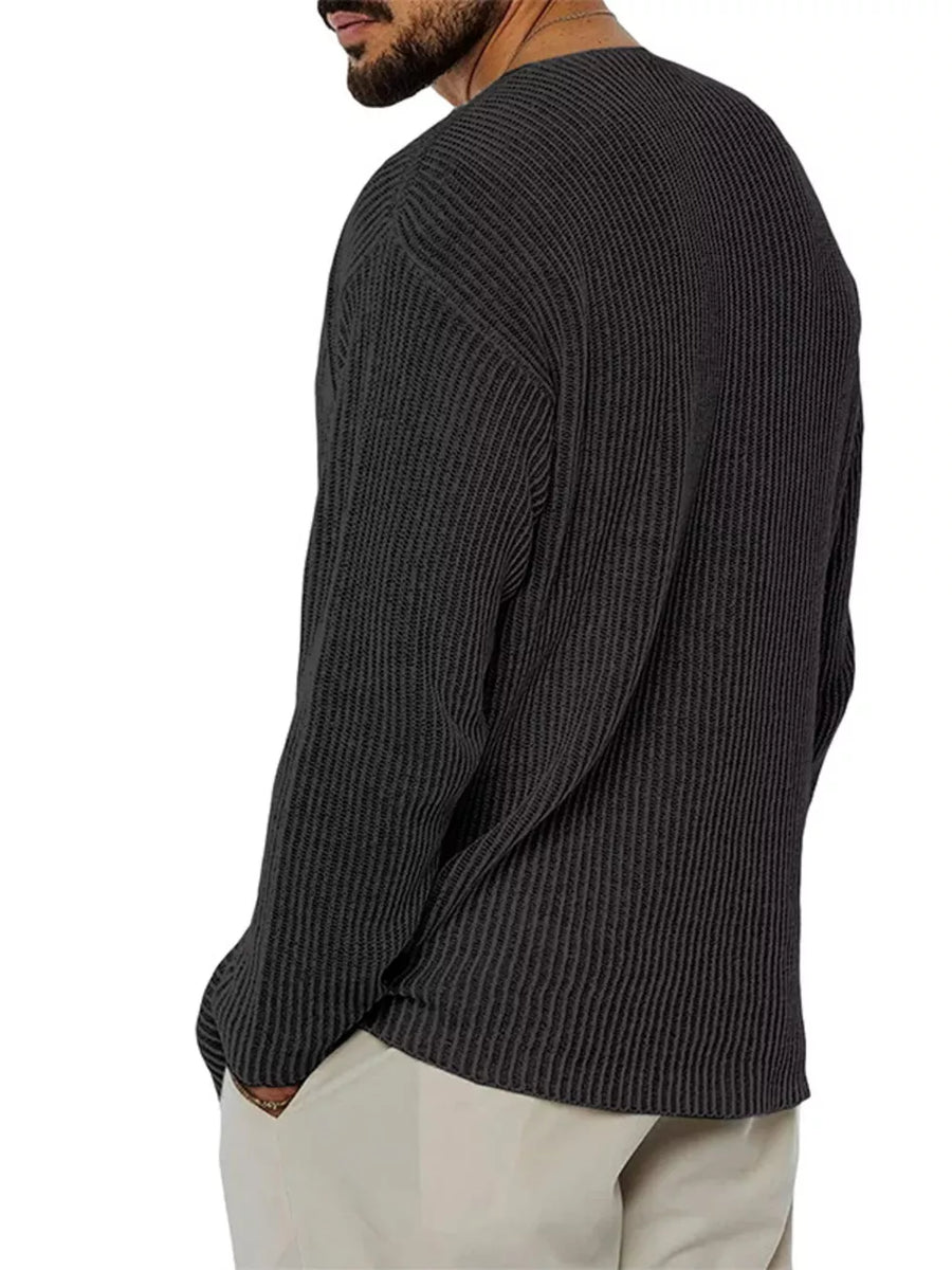 Black v-neck sweater with hip-length and pullover