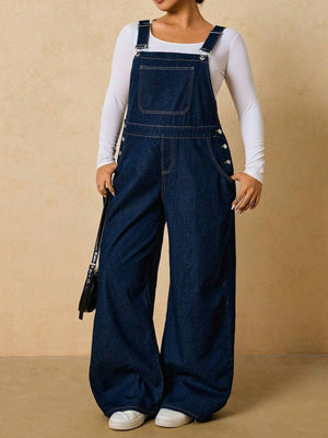 overalls in dark blue featuring adjustable straps and loose fit
