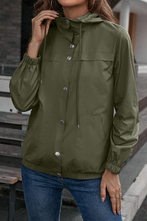 Army green hooded utility jacket with drawstring waist and button front.