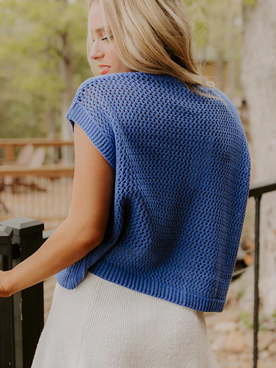 Blue open knit short sleeve crew neck top with ribbed hem.