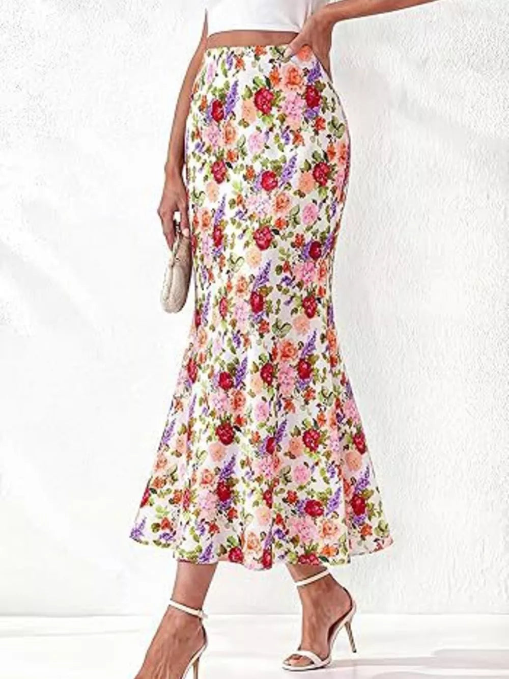 midi skirt in white featuring high-waisted and flared fit