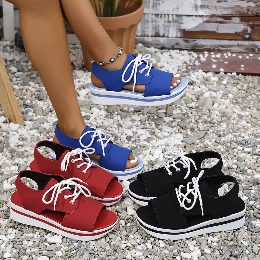 Platform oxford sandals in black, blue, and deep red with white laces and white soles.