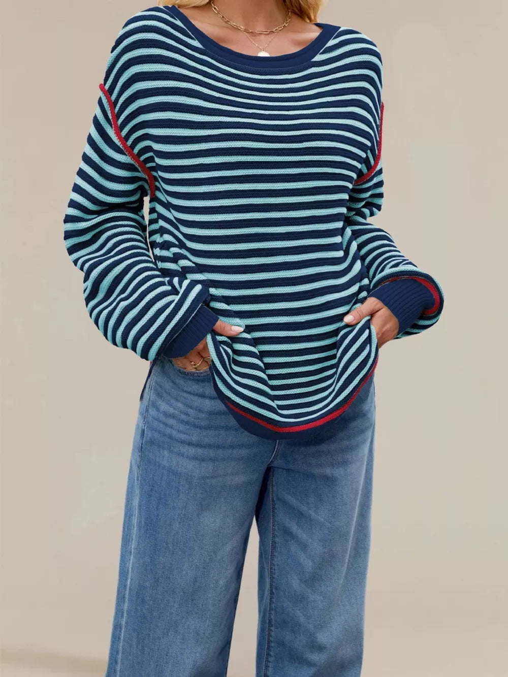 ivory pullover sweater with seam detail and long sleeve