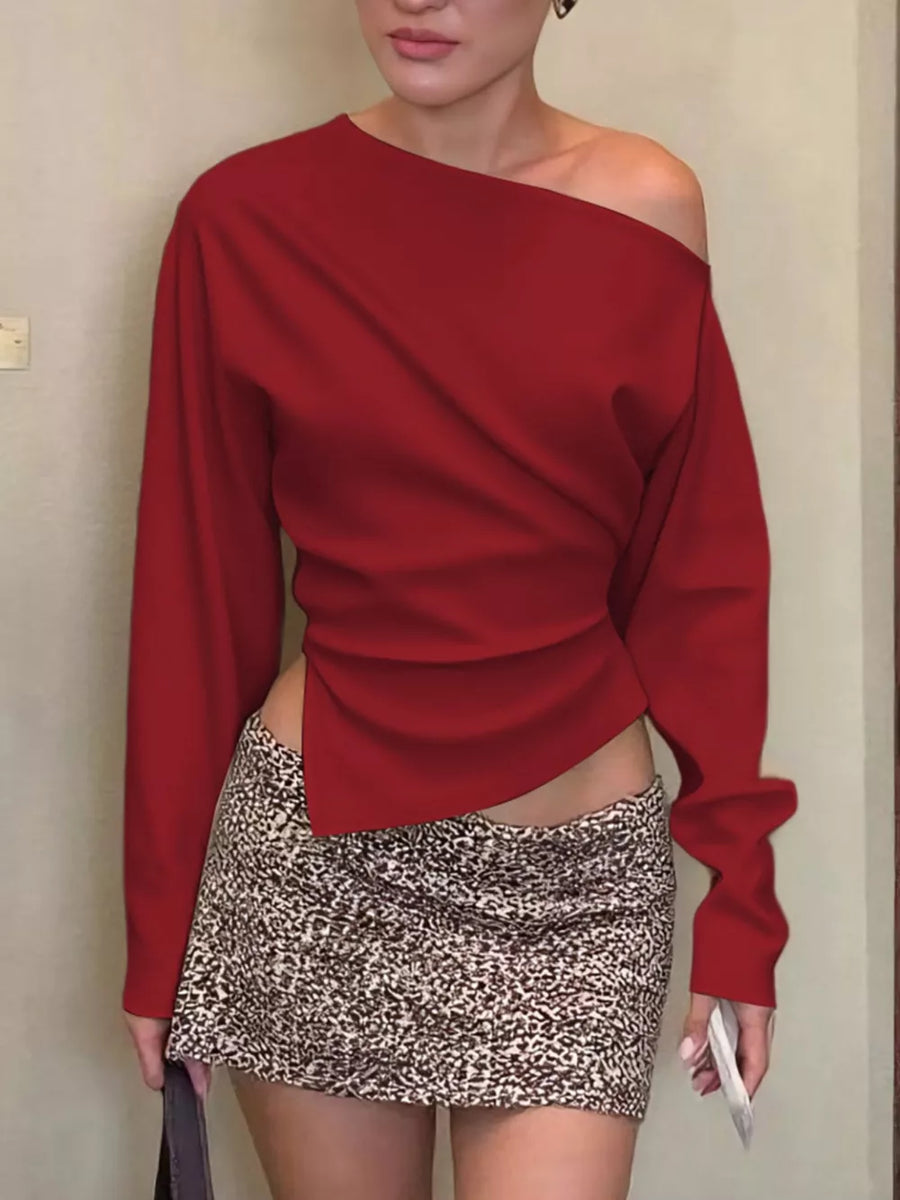 Red draped asymmetrical off-shoulder t-shirt with long sleeves and a unique cut.