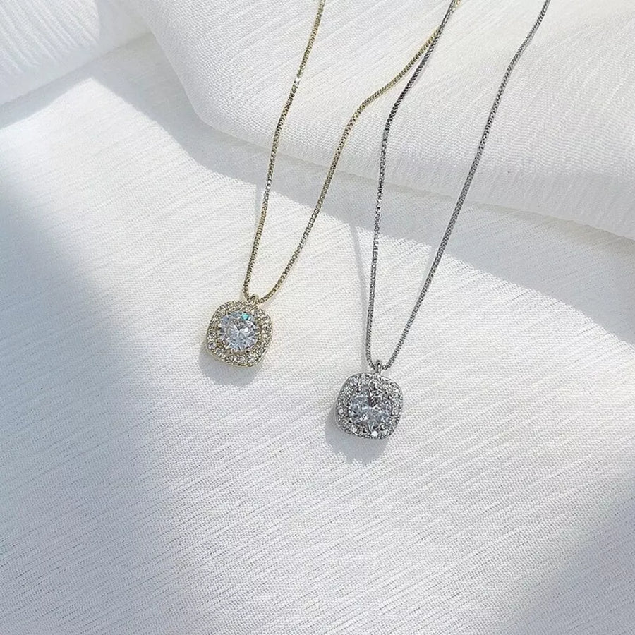 Elegant zircon pendant necklace in sterling silver, gold and silver box chains.