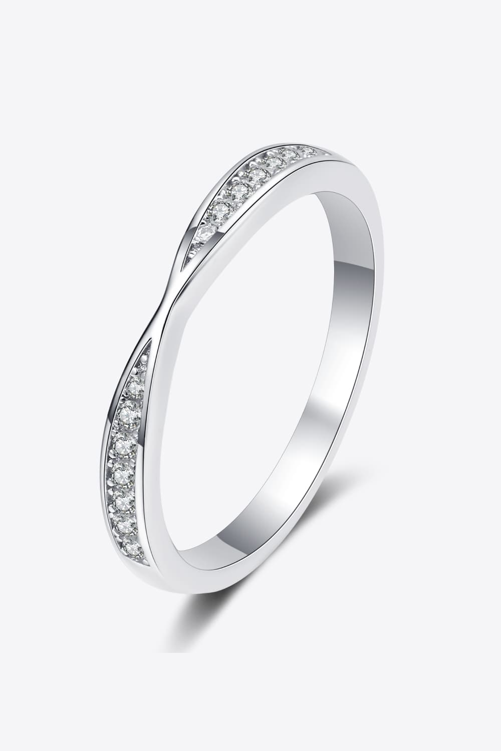 Silver twisted pavé band ring with clear stones
