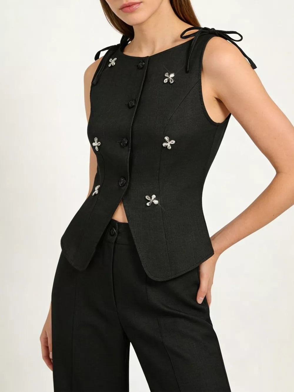 Black embellished tailored vest with tie straps and scalloped hem