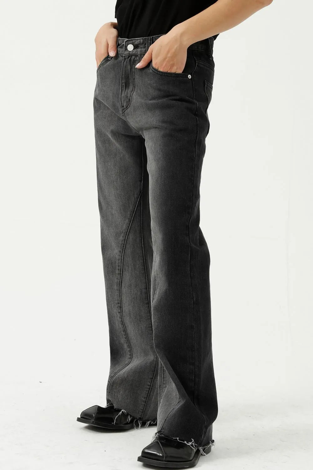 Dark wash cotton flare jeans with seam details and raw hem