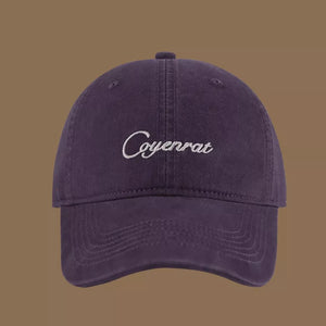 Purple cotton baseball cap with white embroidered text and curved brim