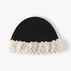 Black ribbed knit beanie with plush faux fur trim