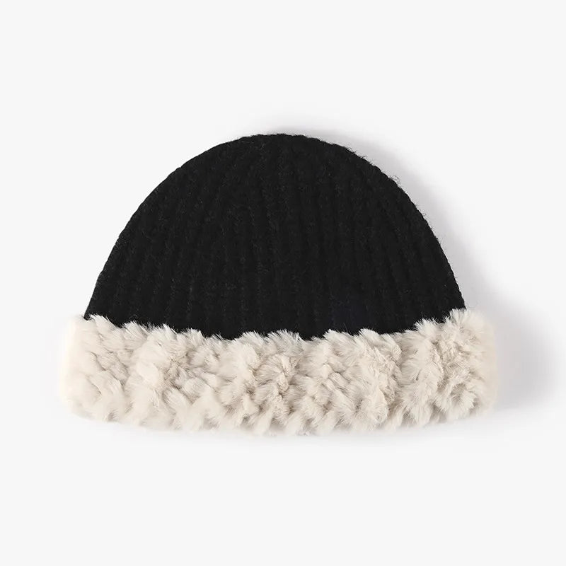 Black ribbed knit beanie with plush faux fur trim