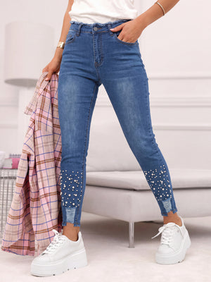 skinny jeans in medium blue featuring high-waisted and slim fit