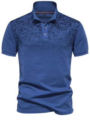Royal blue polo shirt with floral ombre pattern on chest and sleeves