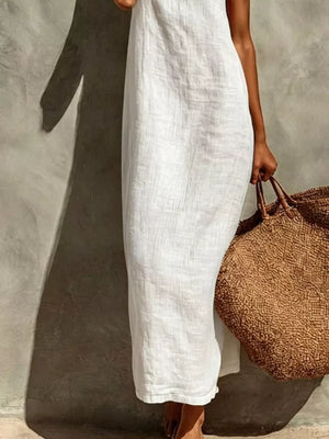 White linen-blend maxi dress with a relaxed fit, sleeveless, and crew neck.