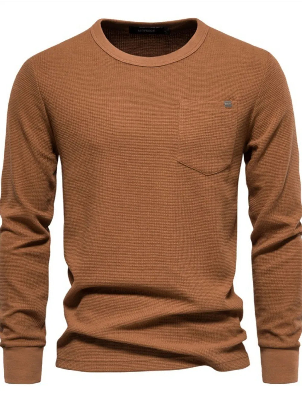 Caramel textured thermal long sleeve tee with crew neck and chest pocket detail.