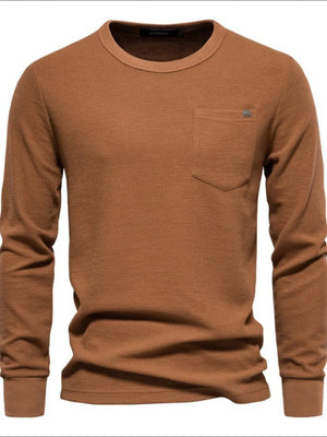 Caramel textured thermal long sleeve tee with crew neck and chest pocket detail.