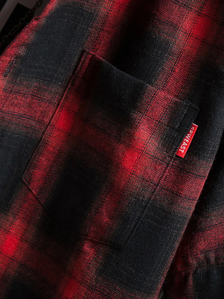 Red and black plaid cotton short-sleeve shirt with chest pocket and red tag detail.
