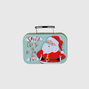 Festive illustrated suitcase tin box with Santa Claus graphic and "Santa Claus Is Coming To Town" text.