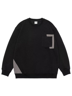 Black crew neck sweatshirt with textured geometric pattern, chest pocket, and contrast panel detail.