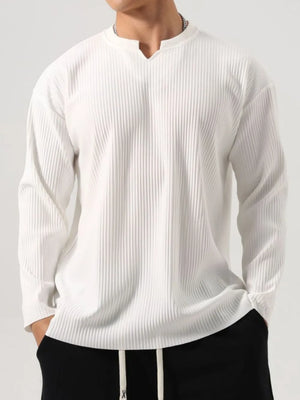 White textured plissé henley long sleeve top with notch neckline