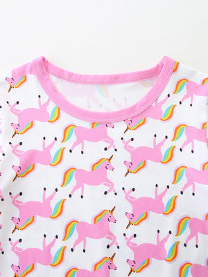 Girls white unicorn print t-shirt with pink trim and crew neck.