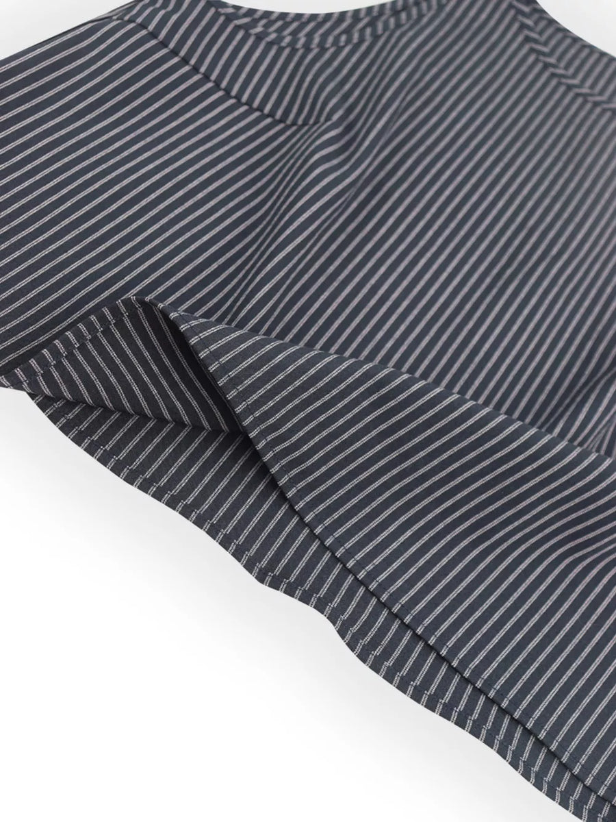 Chic black striped sleeveless top and wide-leg pants set detail.