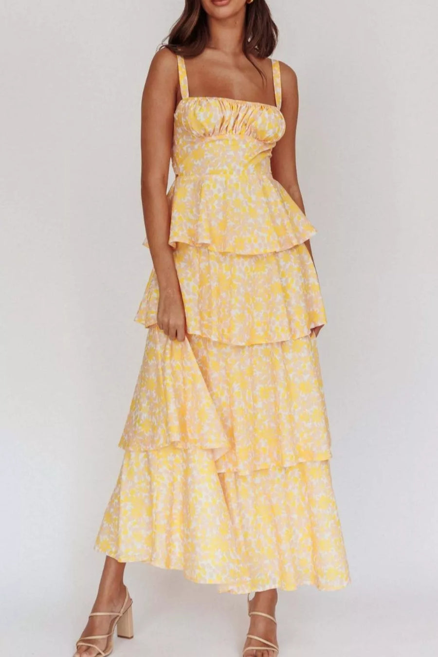 Yellow floral print tiered maxi dress with sweetheart neckline and spaghetti straps
