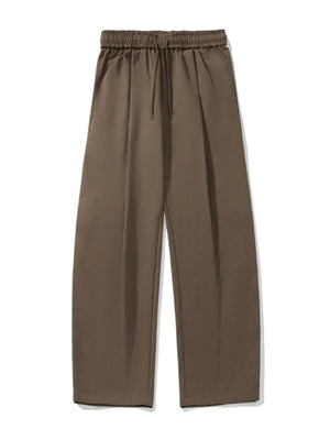 Balloon-fit drawstring trousers in taupe with a wide leg and elasticated waist.