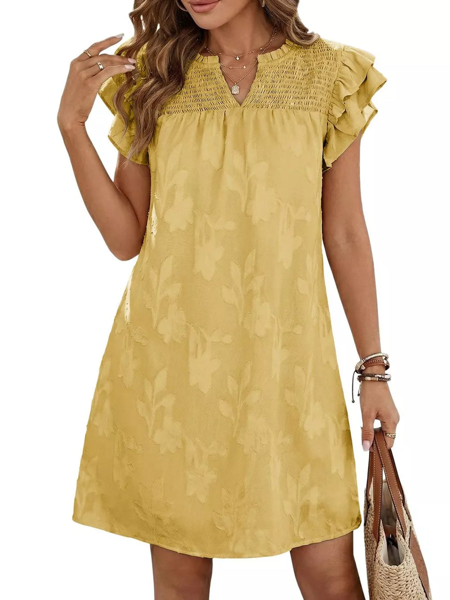 Apricot floral embossed mini dress with smocked bodice and ruffled sleeves.