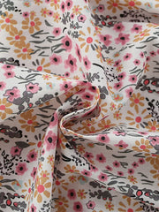 Toddler cotton dress with pink and yellow floral print and ruffle sleeves.