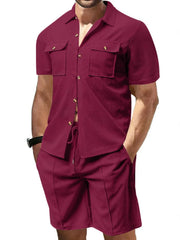 Burgundy textured resort shirt with button pockets and matching drawstring shorts.