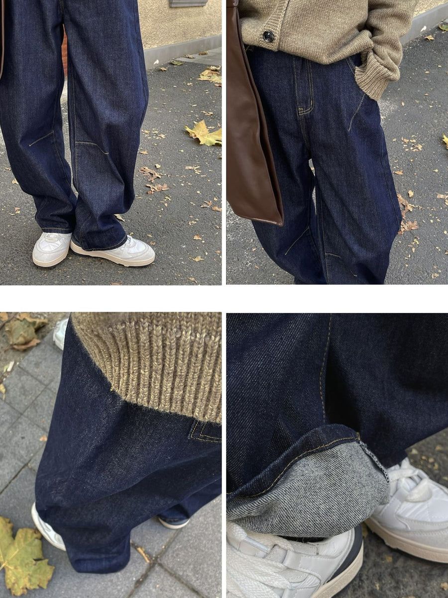 wide-leg jeans in navy blue with seam detail and full-length