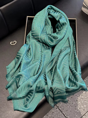 Green Tencel cotton scarf with geometric pattern and fringe detail