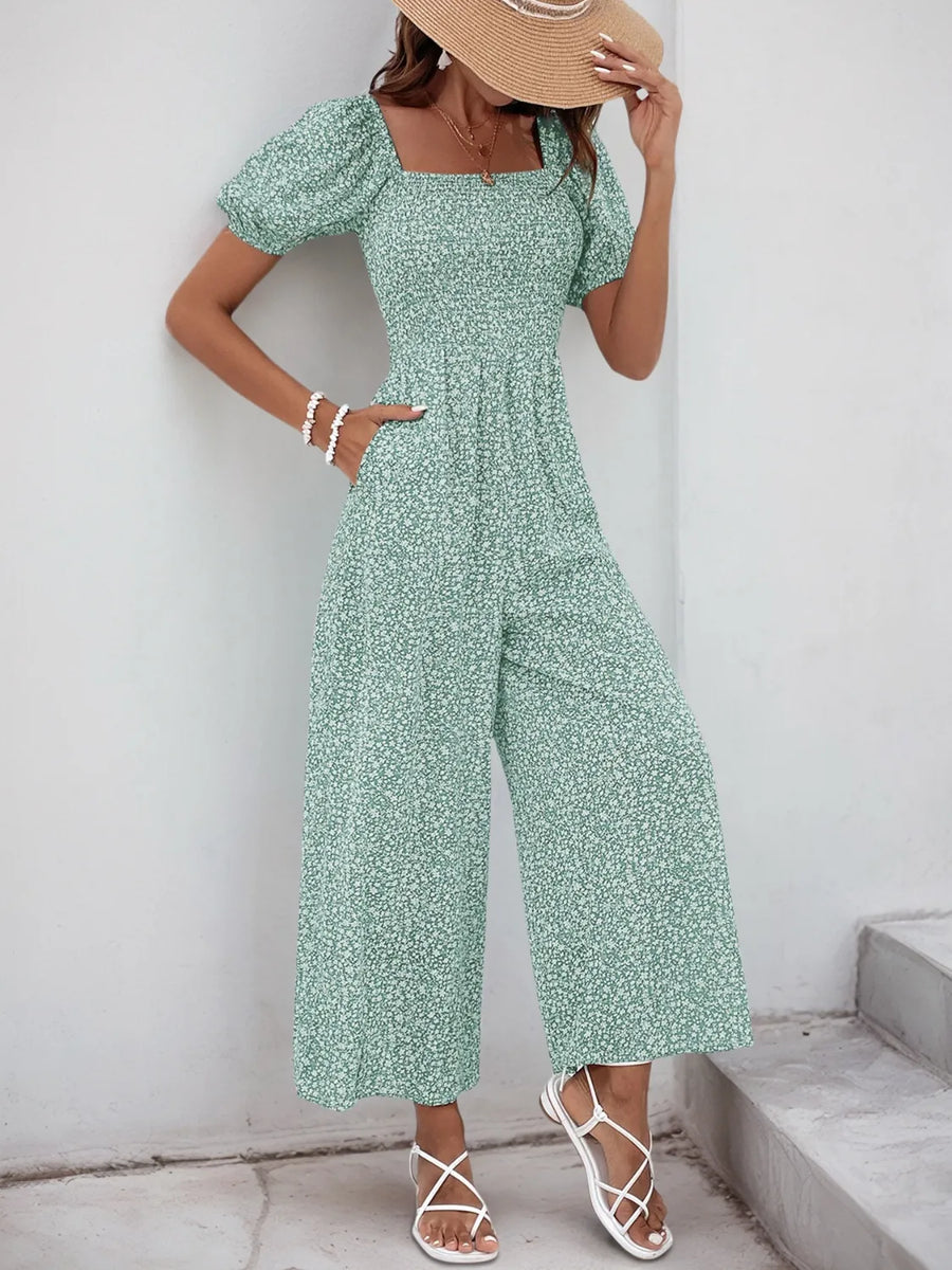 Light green floral print jumpsuit with smocked bodice and puff sleeves