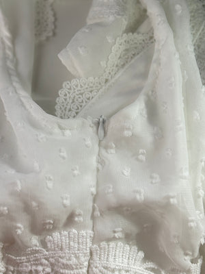 White swiss dot dress with lace trim and zipper
