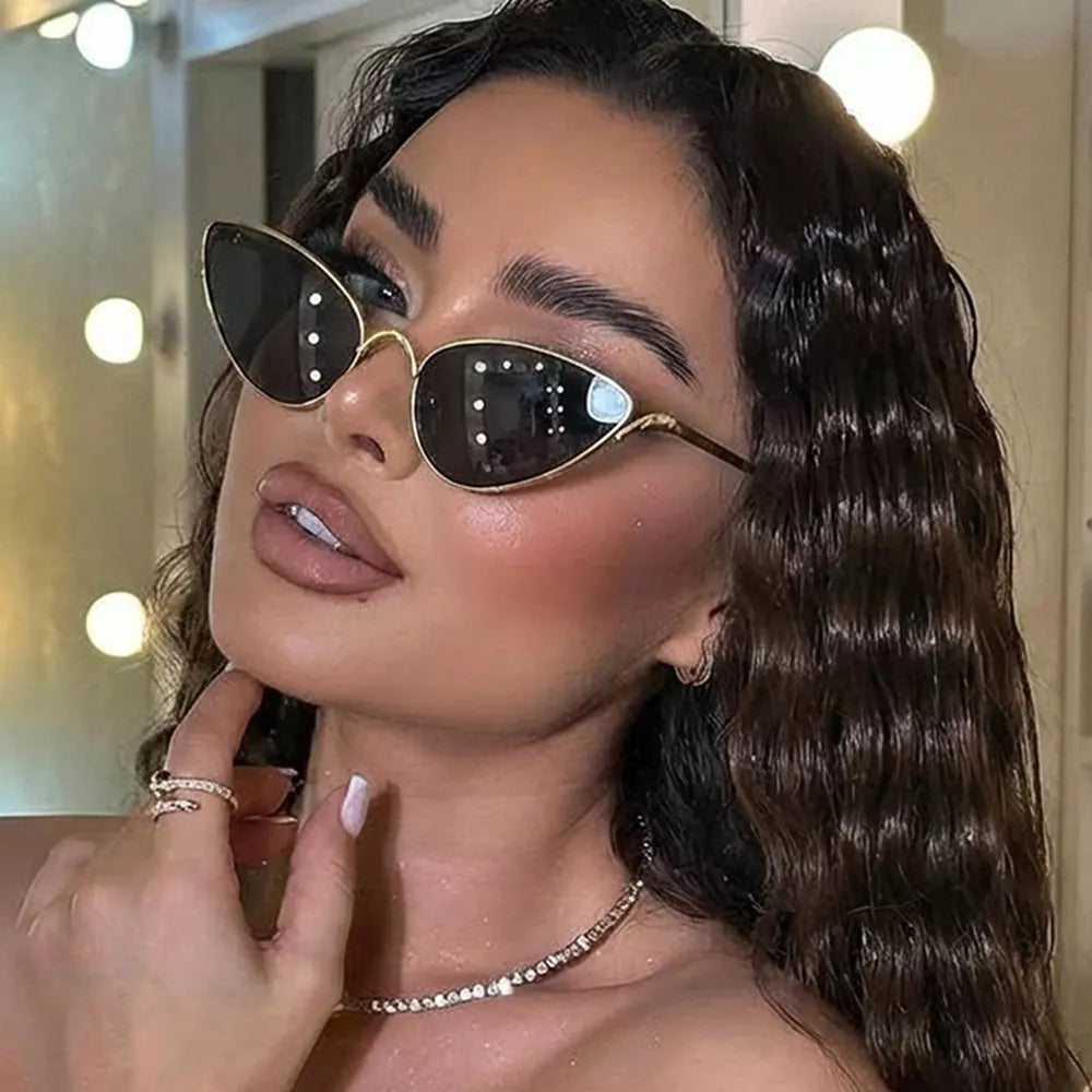 sunglasses in gold featuring UV protection and cat-eye fit