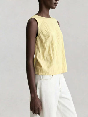 Yellow crinkle tank top with round neck and dart detail.