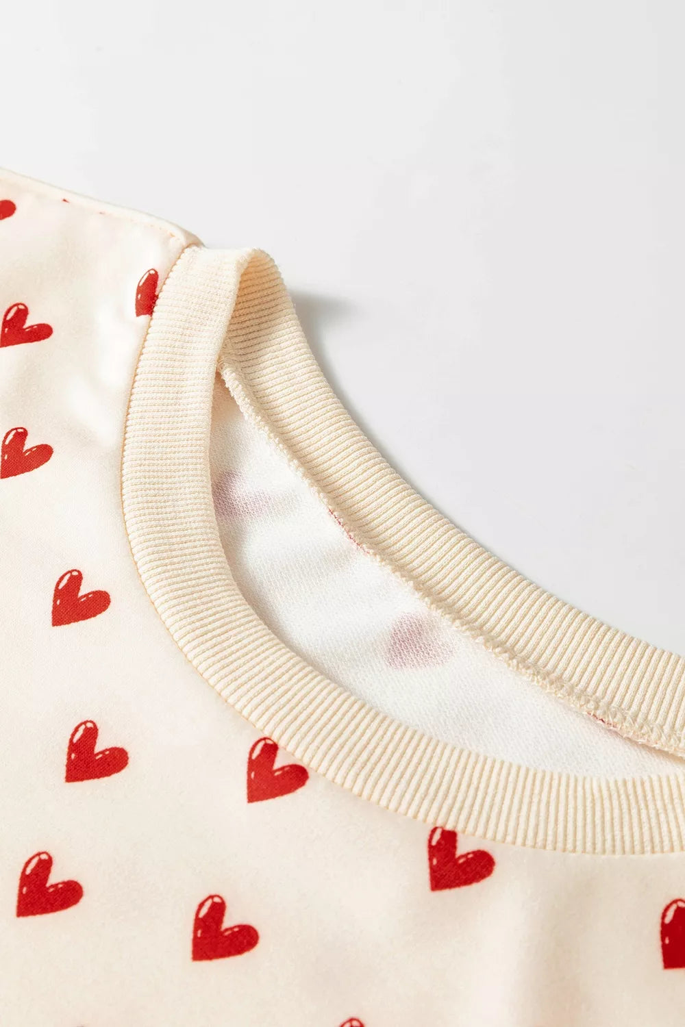 Cream with Heart Print Round Neck Long Sleeve Sweatshirt in Cream
