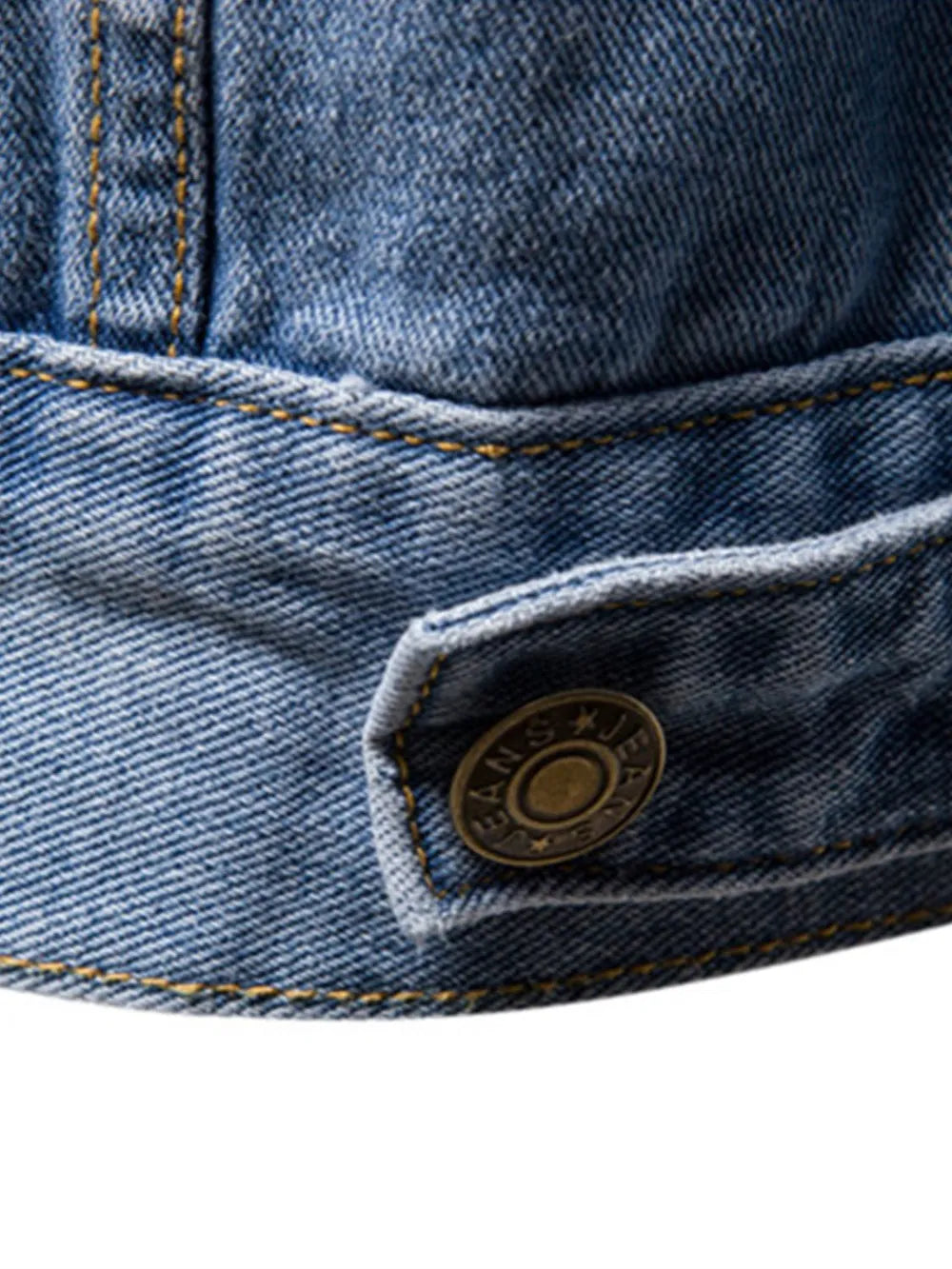 Light wash denim trucker jacket with button detail and classic fit.