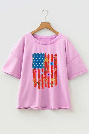 Pink cotton crew neck t-shirt with a floral American flag graphic.
