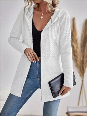Ivory cable-knit hooded zip jacket with textured sleeves and a casual cut.