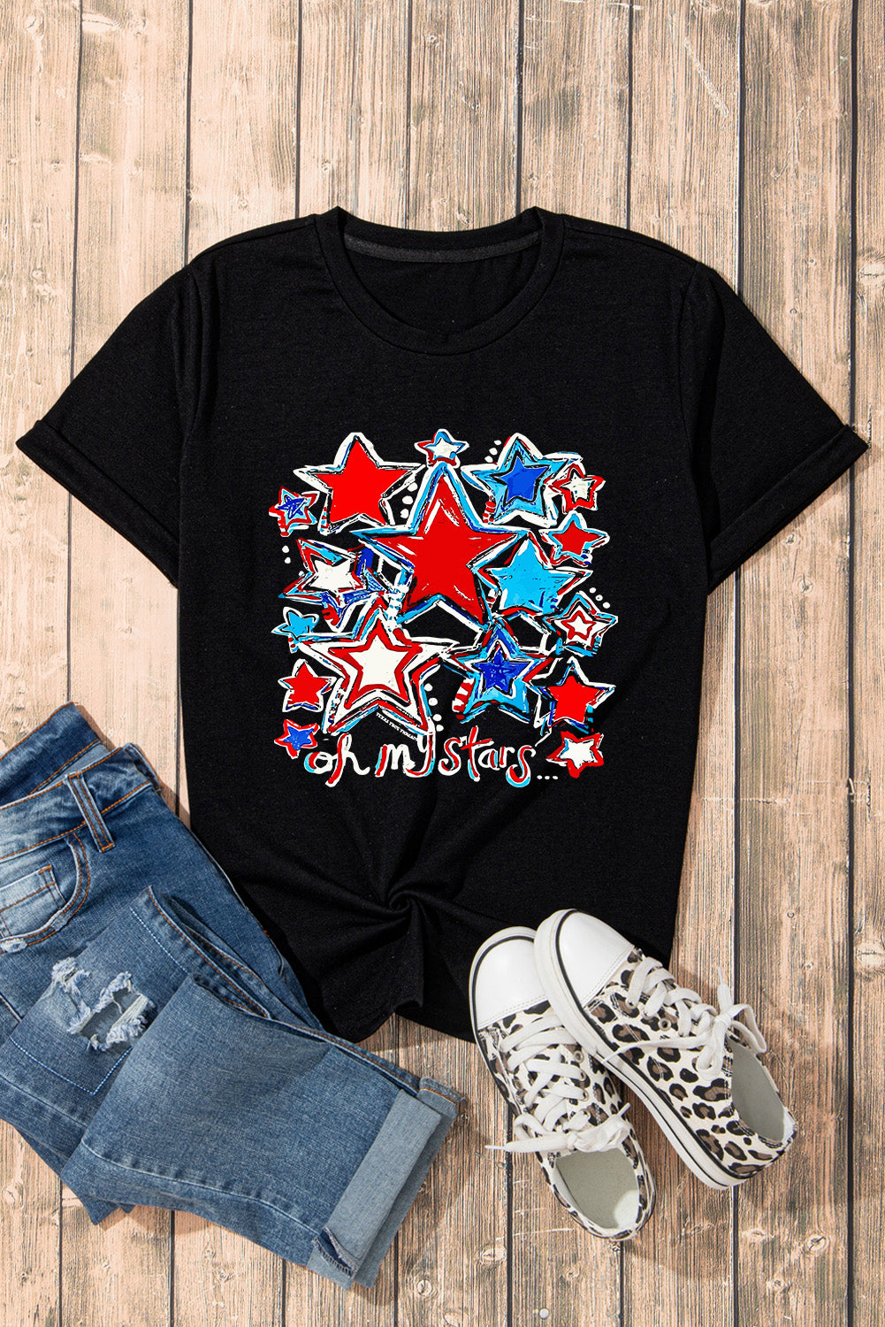 Black t-shirt with rolled sleeves and a red, white, and blue star graphic.