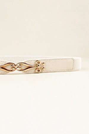 White elastic belt with a sculpted gold alloy clasp and faux leather accents