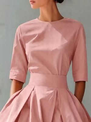 Dusty pink A-line midi dress with pleated skirt and belted waist
