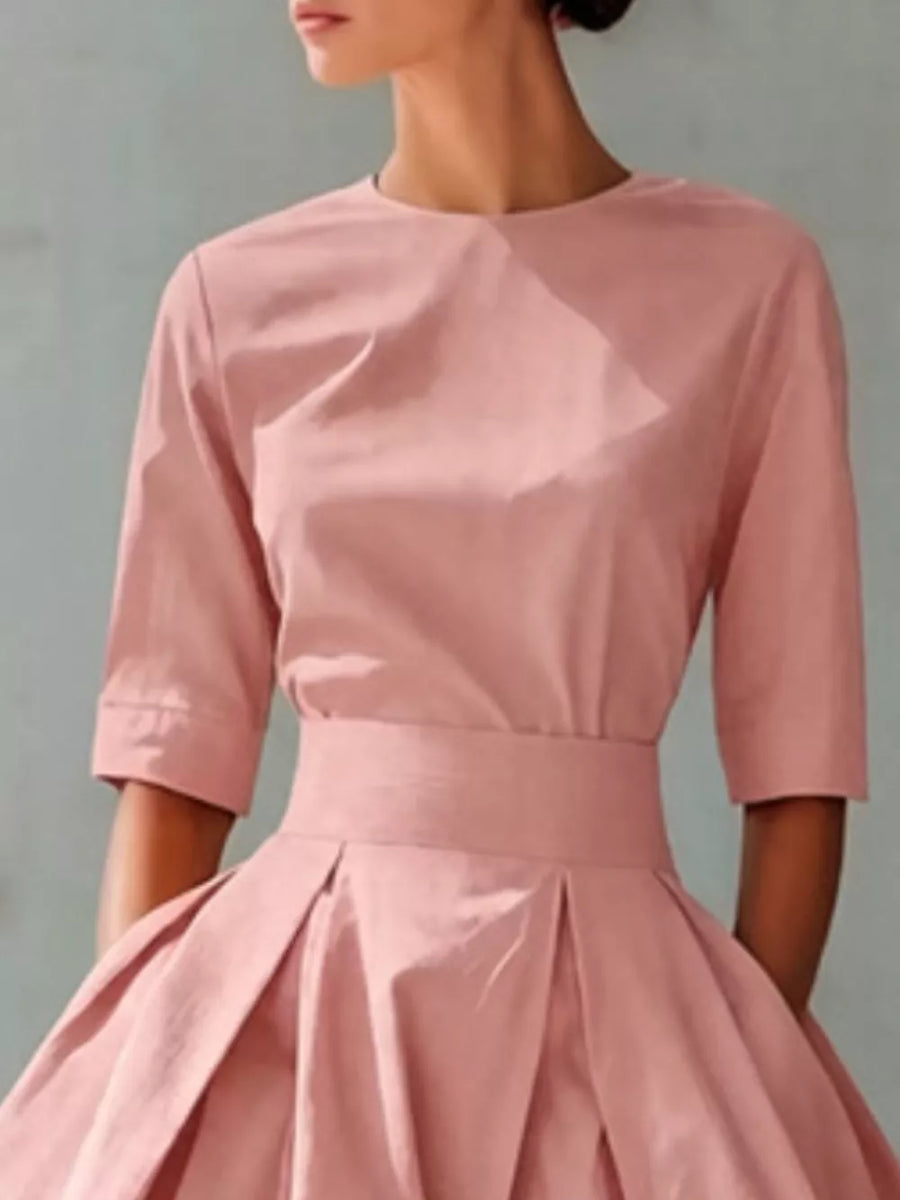 Dusty pink A-line midi dress with pleated skirt and belted waist