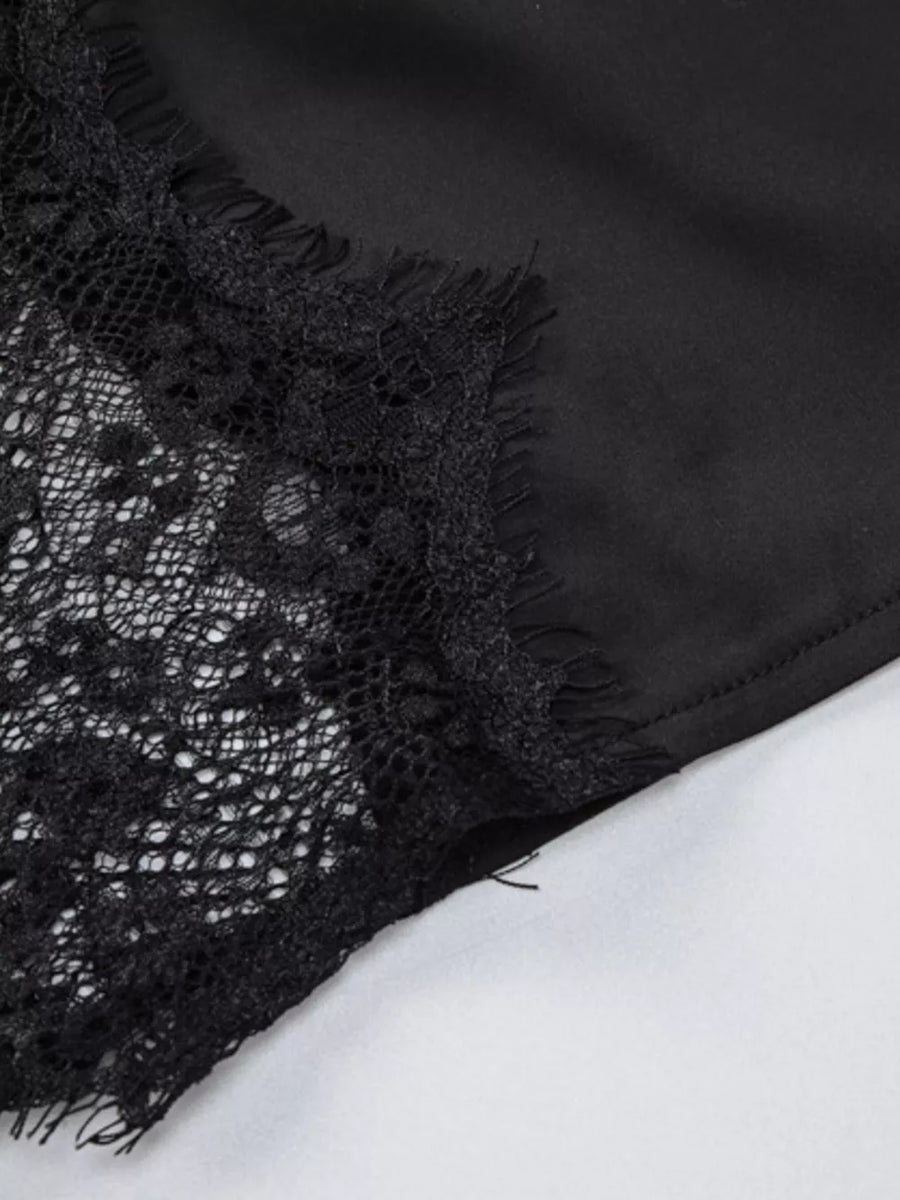 Black lace trim detail on a spaghetti strap dress