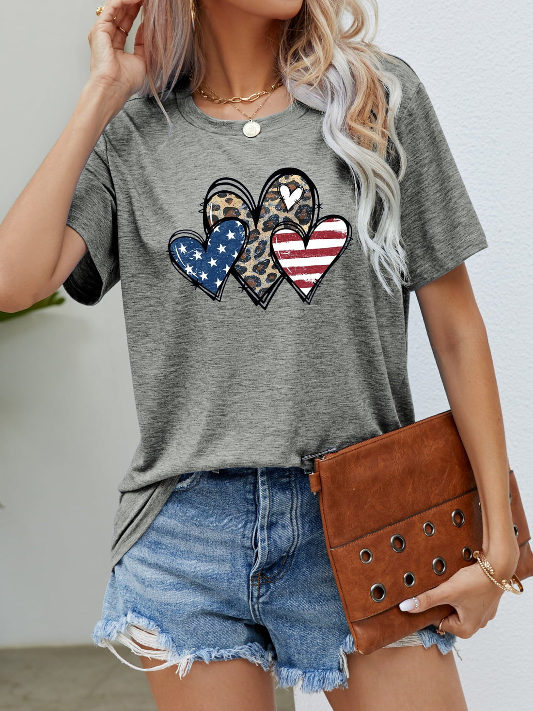Mid Gray t-shirt with three hearts graphic: leopard print, American flag stars, and American flag stripes.
