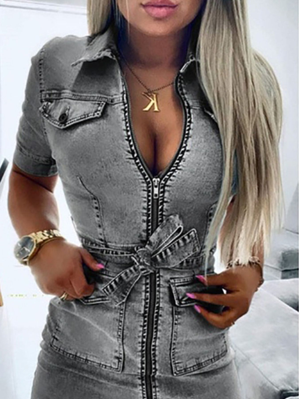 Grey denim shirt dress with zipper front, tie waist, and short sleeves.