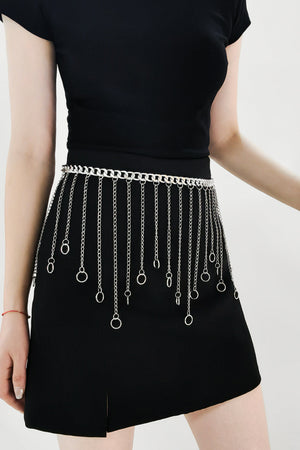 Silver chain belt with cascading rings and chainmail detail